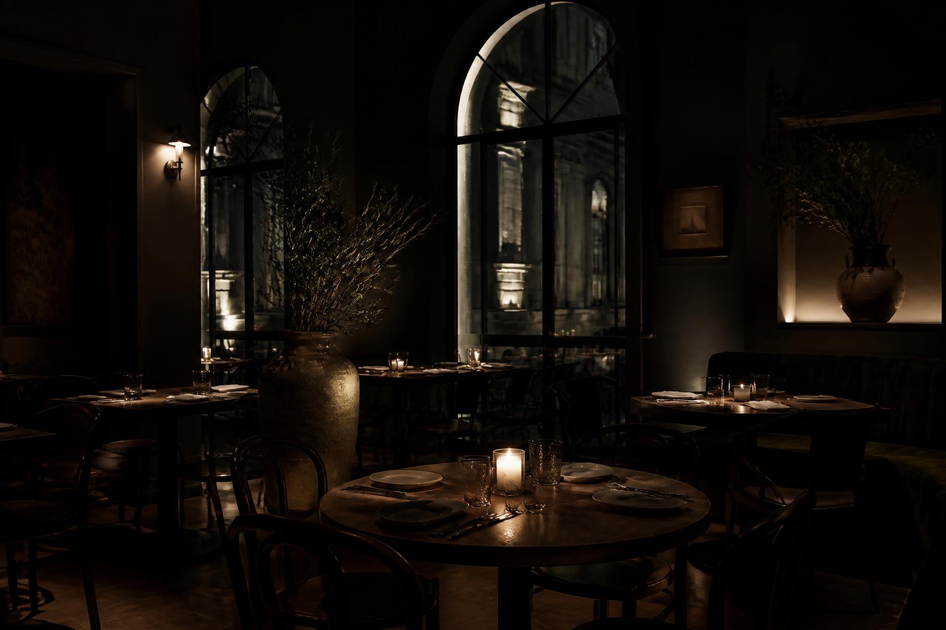 The candlelit dining room at LUMERA